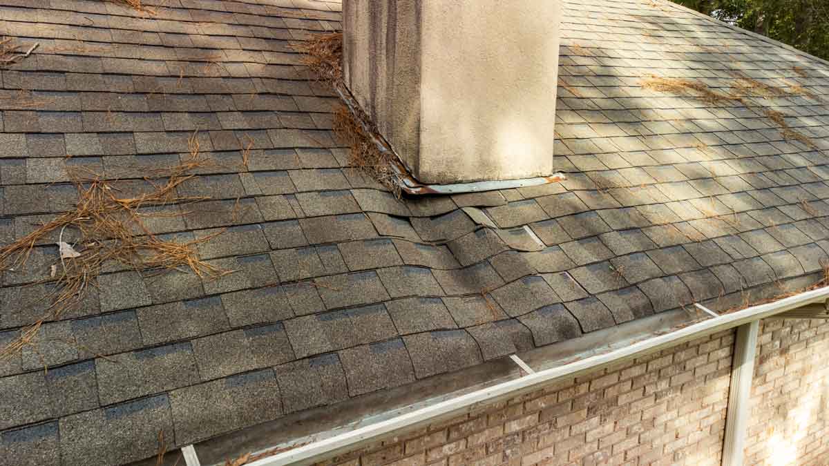 a roof in need of water damage restoration