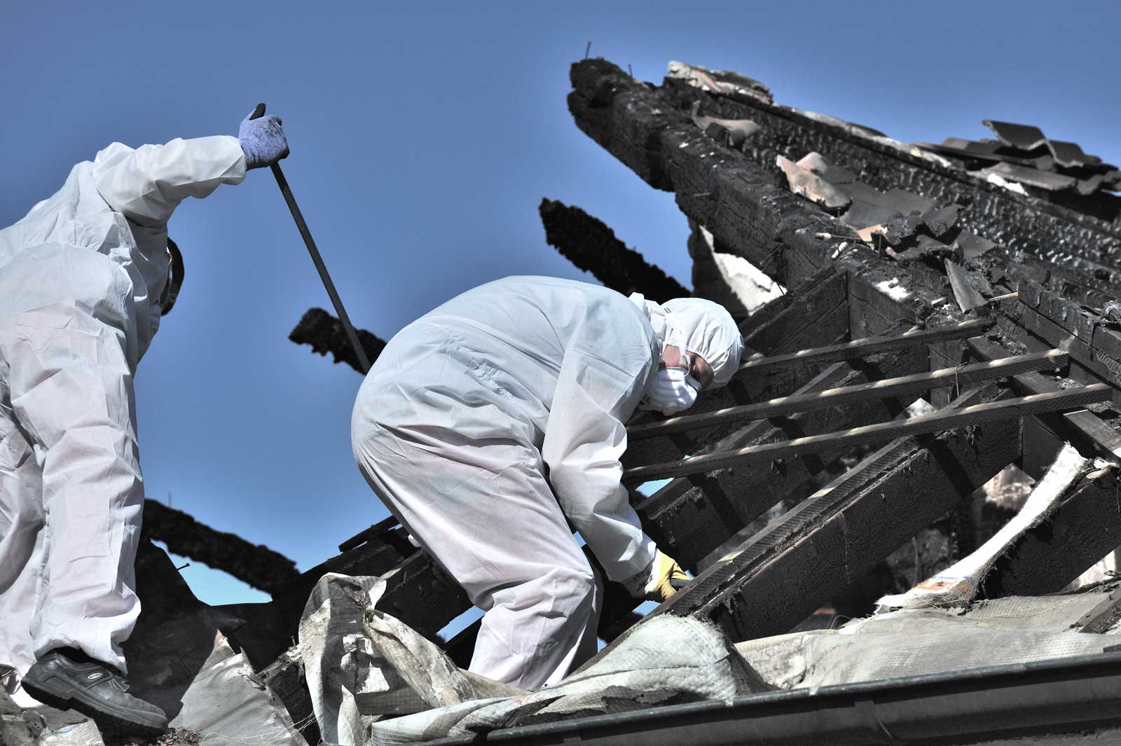 Fire damage restoration clean up on a roof