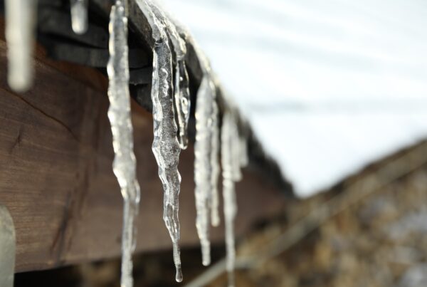 A Texas home prepared for winter with insulated pipes and weatherproofed doors to prevent water damage.